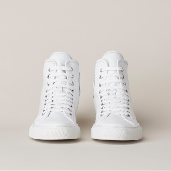 white canvas high top sneakers